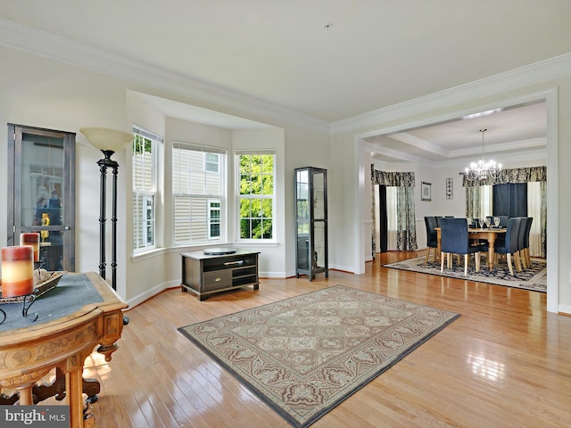 15446 Symondsbury Way, Upper Marlboro, MD 20774 - living area with hardwood / wood-style floors, a chandelier, ornamental molding, and baseboards