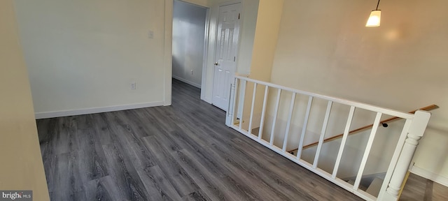 3063 Joyce St, Philadelphia, PA 19134 - hall featuring dark wood-style floors and baseboards