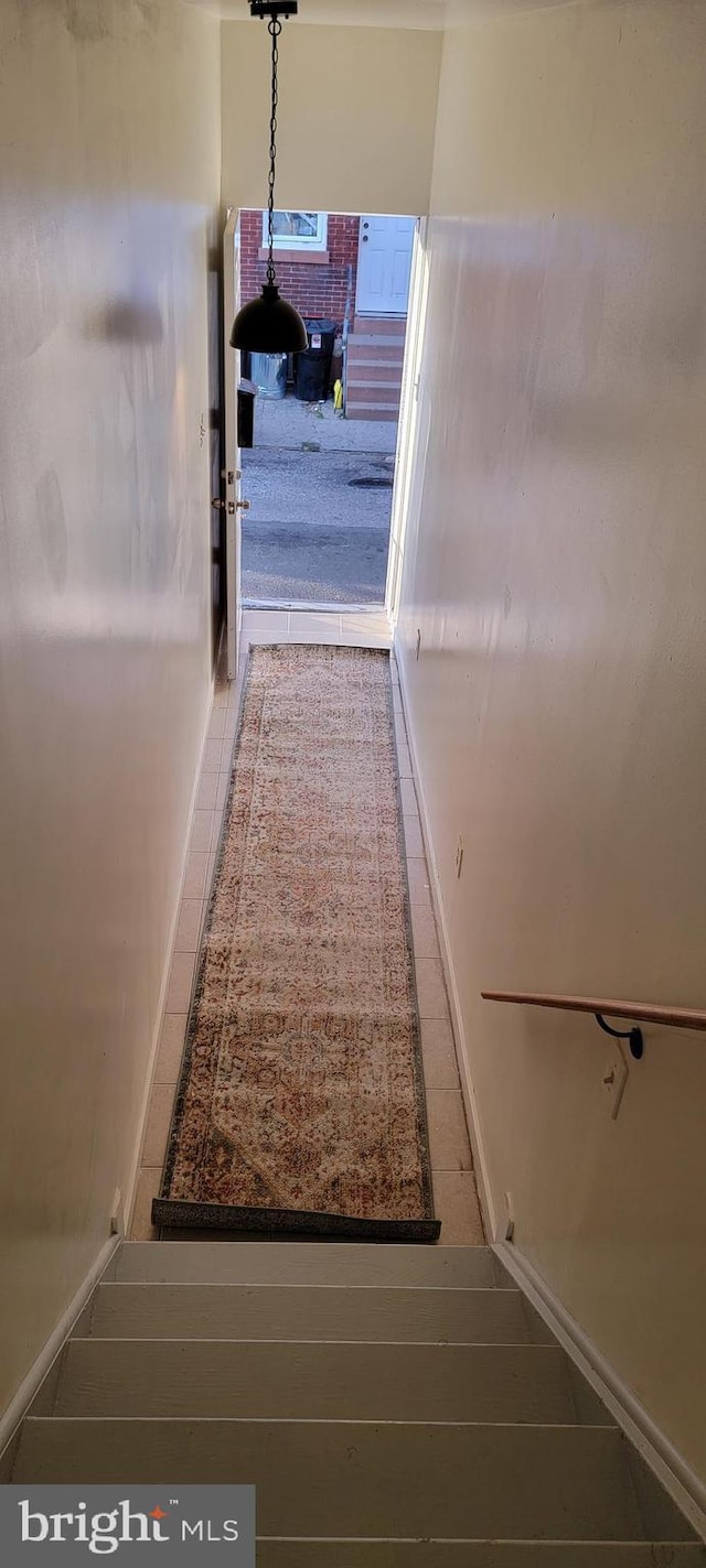 3063 Joyce St, Philadelphia, PA 19134 - corridor with baseboards and tile patterned flooring