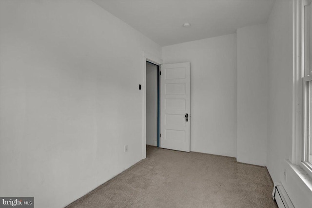 2500 Penn Ave, West Lawn, PA 19609 - empty room with a baseboard radiator and light colored carpet