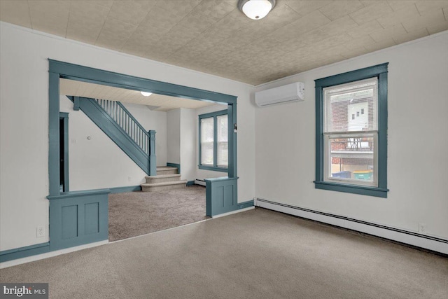 2500 Penn Ave, West Lawn, PA 19609 - carpeted empty room with baseboard heating, healthy amount of natural light, a wall unit AC, and stairway