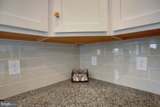 21 Bayberry Rd, Carlisle, PA 17013 - kitchen view of decorative backsplash, white cabinets, and stone counters
