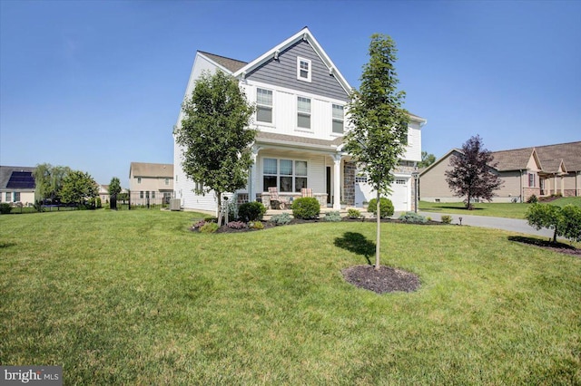 21 Bayberry Rd, Carlisle, PA 17013 - view of front of property with a garage and a front yard
