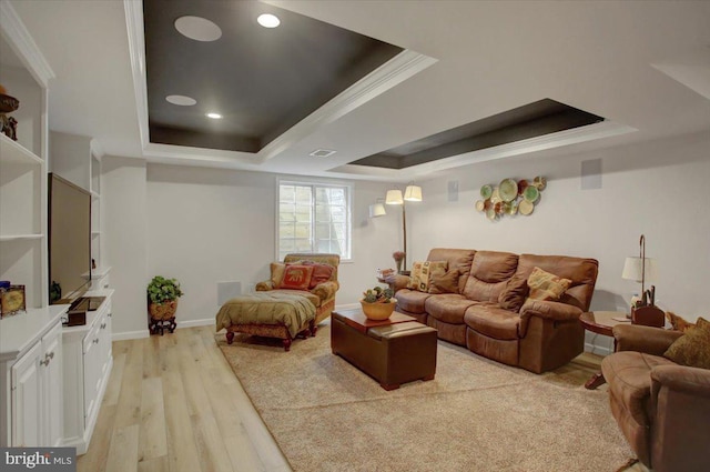 21 Bayberry Rd, Carlisle, PA 17013 - living area with a tray ceiling, light wood-style flooring, and crown molding