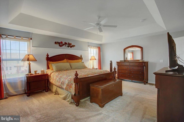 21 Bayberry Rd, Carlisle, PA 17013 - carpeted bedroom with a raised ceiling, multiple windows, and a ceiling fan