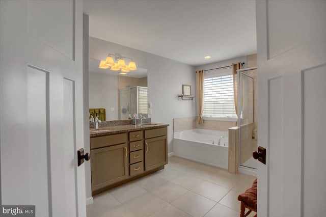 21 Bayberry Rd, Carlisle, PA 17013 - full bathroom featuring a stall shower, a bath, tile patterned flooring, and double vanity