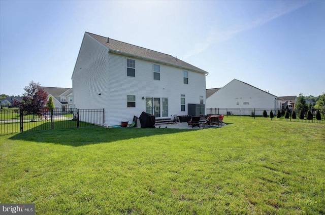 21 Bayberry Rd, Carlisle, PA 17013 - rear view of house with a fenced backyard, a patio, and an outdoor fire pit