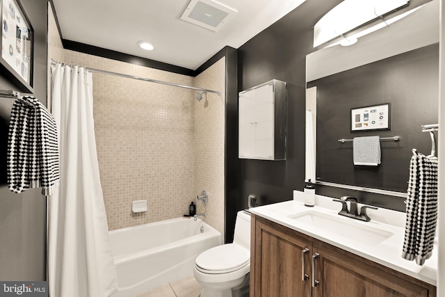 2125 14th St NW Unit 427, Washington, DC 20009 - bathroom with shower / bath combo with shower curtain, toilet, vanity, and tile patterned floors