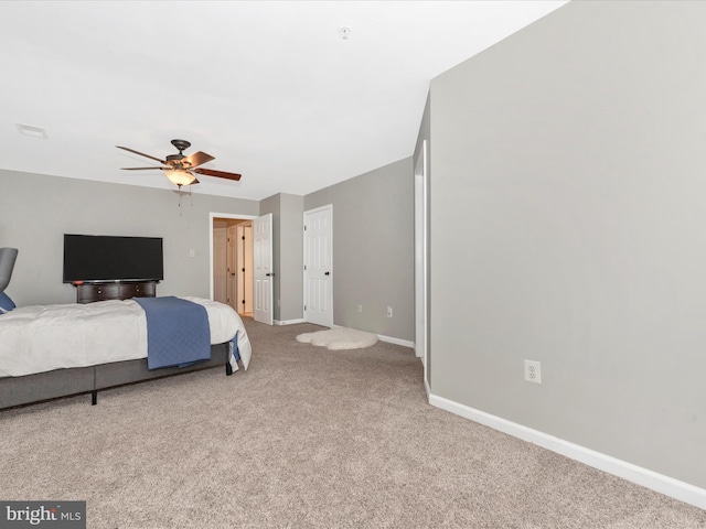 6529 Carston Ct, Frederick, MD 21703 - carpeted bedroom featuring baseboards and a ceiling fan