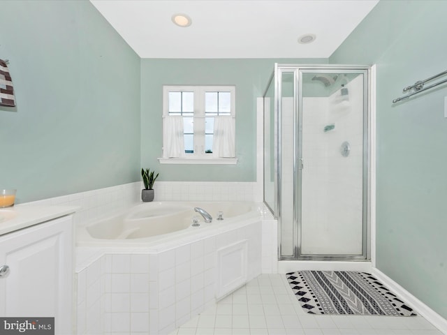 6529 Carston Ct, Frederick, MD 21703 - full bath with a garden tub, a shower stall, tile patterned floors, and vanity