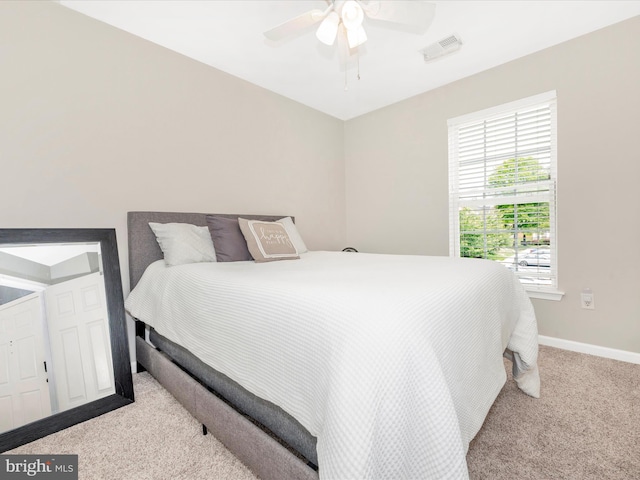 6529 Carston Ct, Frederick, MD 21703 - carpeted bedroom with baseboards and a ceiling fan
