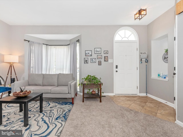 6529 Carston Ct, Frederick, MD 21703 - carpeted living area with baseboards and tile patterned flooring