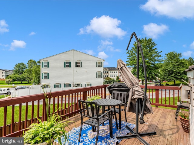 6529 Carston Ct, Frederick, MD 21703 - deck with outdoor dining area and a lawn
