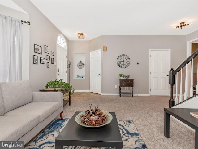 6529 Carston Ct, Frederick, MD 21703 - carpeted living room with stairs and baseboards