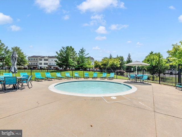 6529 Carston Ct, Frederick, MD 21703 - community pool featuring a patio area and outdoor dining area