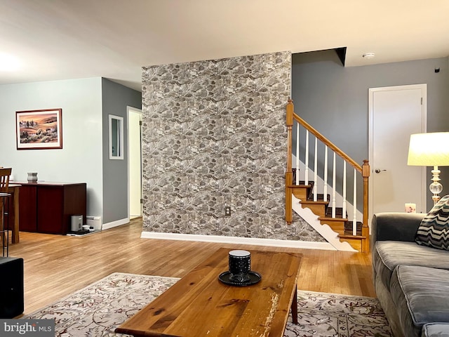 838 N Hanover St, Pottstown, PA 19464 - living room featuring wood finished floors, stairs, and baseboards