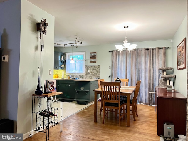 838 N Hanover St, Pottstown, PA 19464 - dining space featuring a chandelier and light wood-type flooring