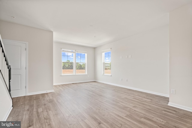 15006 General Lafayette Blvd, Brandywine, MD 20613 - empty room featuring light wood-type flooring, stairway, and baseboards