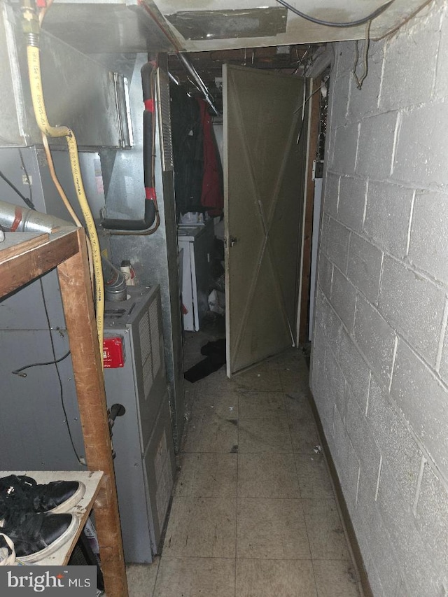 6340 Calvert St, Philadelphia, PA 19149 - unfinished below grade area featuring concrete block wall and washer / dryer