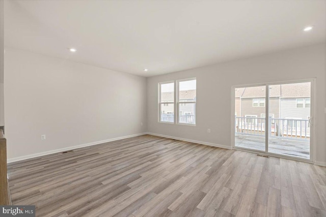 64 Anthem St, Ranson, WV 25438 - empty room featuring light wood-type flooring, baseboards, and recessed lighting
