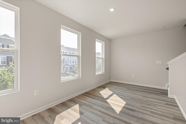 64 Anthem St, Ranson, WV 25438 - spare room featuring light wood-type flooring and baseboards