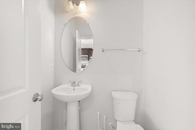 64 Anthem St, Ranson, WV 25438 - bathroom with toilet and a sink