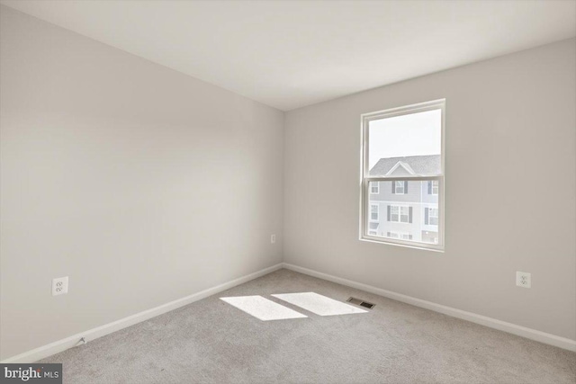 64 Anthem St, Ranson, WV 25438 - empty room with carpet and baseboards