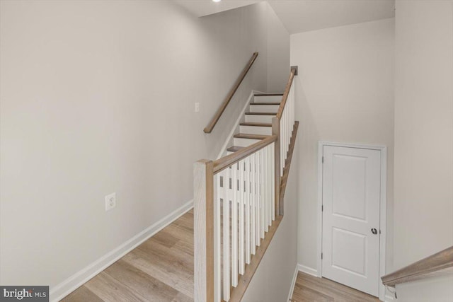 64 Anthem St, Ranson, WV 25438 - stairs with wood finished floors and baseboards