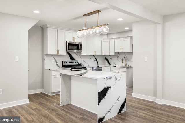 8255 Mertztown Rd, Alburtis, PA 18011 - kitchen featuring stainless steel appliances, a sink, recessed lighting, white cabinetry, and light stone countertops
