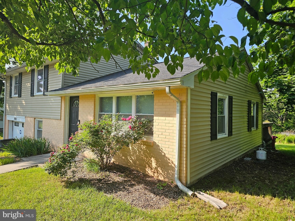 1090 Levengood Rd, Pottstown, PA 19464 - view of front of property featuring brick siding and roof with shingles