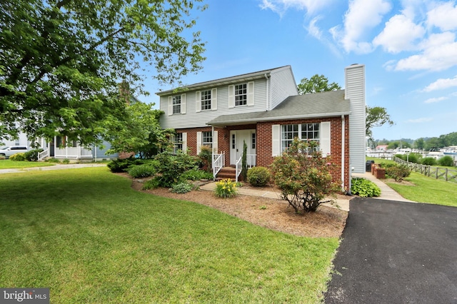 6082 Drum Point Rd, Deale, MD 20751 - view of front of property featuring brick siding and a chimney