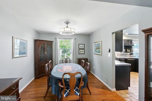6082 Drum Point Rd, Deale, MD 20751 - dining space featuring baseboards and light wood-style floors