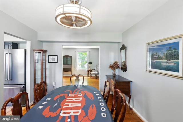6082 Drum Point Rd, Deale, MD 20751 - dining room featuring wood finished floors and baseboards