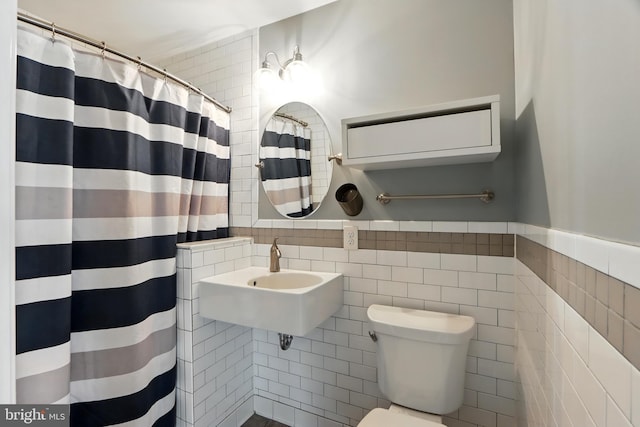 6082 Drum Point Rd, Deale, MD 20751 - bathroom with tile walls and a shower with shower curtain