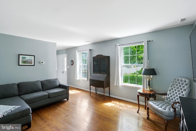 6082 Drum Point Rd, Deale, MD 20751 - living room featuring wood finished floors and baseboards