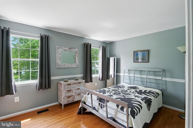 6082 Drum Point Rd, Deale, MD 20751 - bedroom with wood finished floors and baseboards