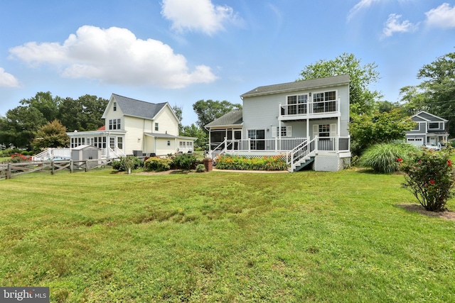 6082 Drum Point Rd, Deale, MD 20751 - rear view of house with a sunroom