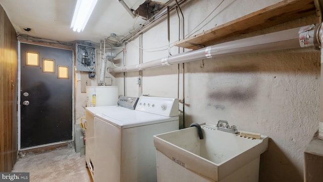 6254 Marsden St, Philadelphia, PA 19135 - washroom featuring a sink, washer and clothes dryer, and gas water heater
