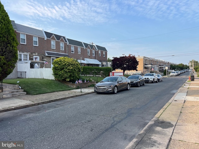 6254 Marsden St, Philadelphia, PA 19135 - view of asphalt road featuring sidewalks, curbs, and a residential view