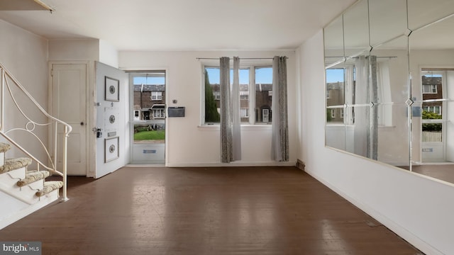 6254 Marsden St, Philadelphia, PA 19135 - foyer featuring wood finished floors, stairs, and baseboards