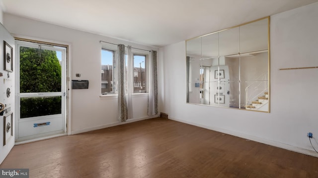 6254 Marsden St, Philadelphia, PA 19135 - spare room with plenty of natural light, wood finished floors, and baseboards