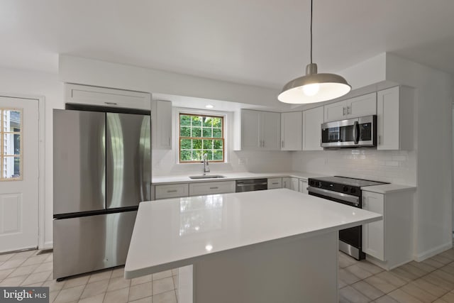 6 Constantine Dr, Phoenix, MD 21131 - kitchen with stainless steel appliances, a sink, light countertops, and decorative backsplash