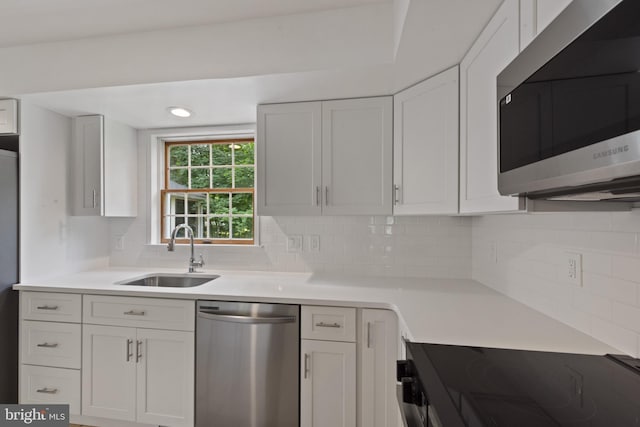 6 Constantine Dr, Phoenix, MD 21131 - kitchen featuring stainless steel appliances, a sink, and white cabinets