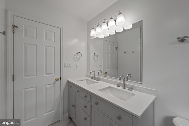 6 Constantine Dr, Phoenix, MD 21131 - full bath featuring double vanity, toilet, and marble finish floors