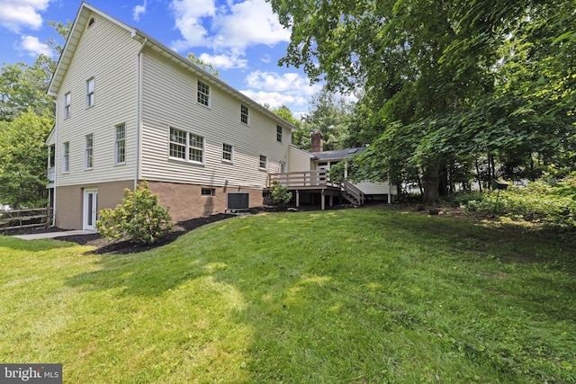 6 Constantine Dr, Phoenix, MD 21131 - rear view of property featuring cooling unit, a lawn, and a deck
