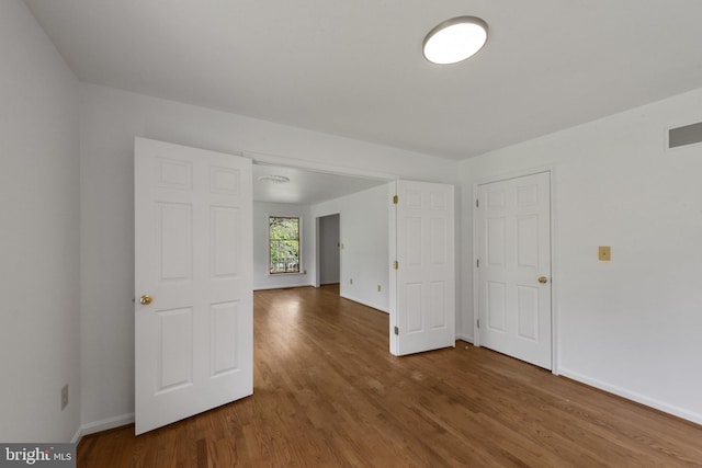 6 Constantine Dr, Phoenix, MD 21131 - empty room with wood finished floors and baseboards