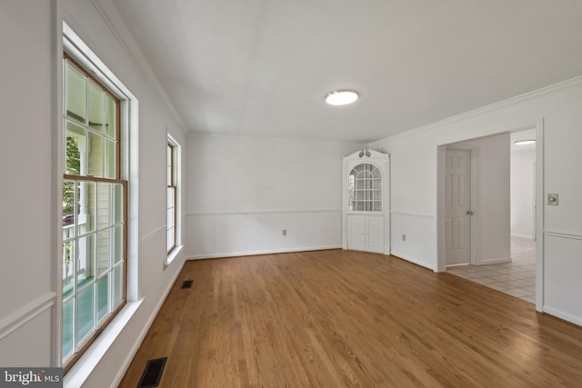 6 Constantine Dr, Phoenix, MD 21131 - spare room featuring ornamental molding, wood finished floors, baseboards, and arched walkways