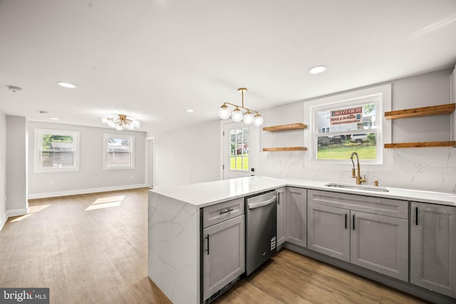 8255 Mertztown Rd, Alburtis, PA 18011 - kitchen featuring gray cabinetry, dishwasher, open shelves, a sink, and a peninsula