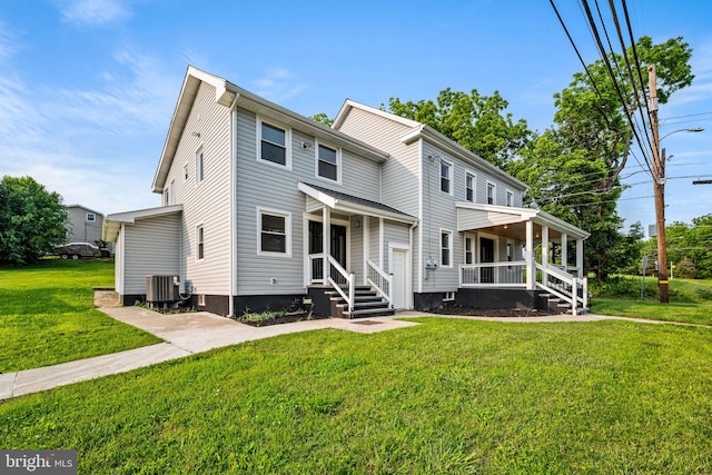 8255 Mertztown Rd, Alburtis, PA 18011 - view of front facade with a front lawn, covered porch, and central air condition unit