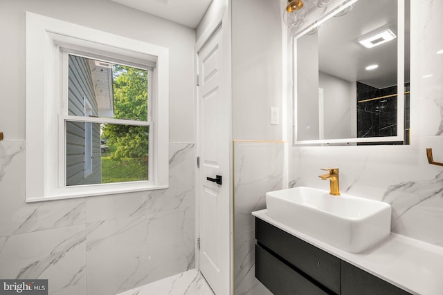 8255 Mertztown Rd, Alburtis, PA 18011 - full bathroom featuring vanity, tile walls, and marble finish flooring